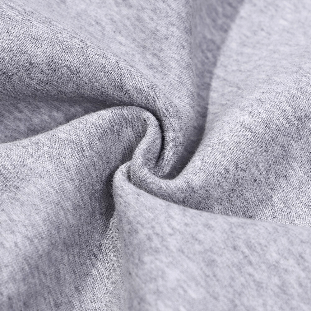 Soft grey fabric texture of warm sports sweatshirt, highlighting its comfortable polyester material.